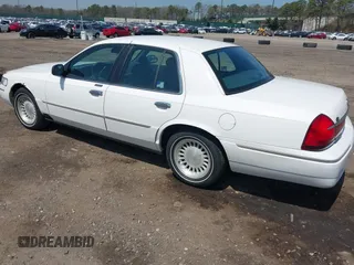 1998 Mercury Grand Marquis LS with VIN 2MEFM75W3WX644251, listed as a IAAI auction lot 42099151 with 195,304 mi miles and . Bid and sale history available at DreamBid. Image 3.