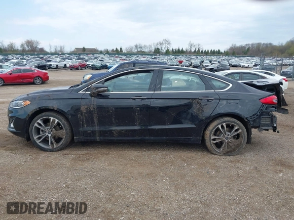 2020 Ford Fusion Titanium with VIN 3FA6P0D9XLR174523, listed as a IAAI auction lot 42100113 with 100,602 mi miles and . Bid and sale history available at DreamBid. Image 15.