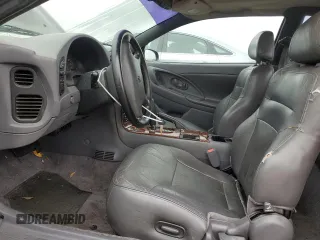 1997 Chrysler Sebring LXi z VIN 4C3AU52N2VE183090, wystawiony jako Copart lot #81855454 z przebiegiem 157 590 mil mil oraz Szkoda całkowita • Salvage title. Historia ofert i sprzedaży dostępna na DreamBid. Obrazek 7.
