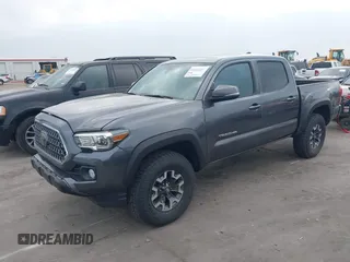 2018 Toyota Tacoma SR with VIN 5TFCZ5AN6JX127774, listed as a IAAI auction lot 41801158 with 28,161 mi miles and . Bid and sale history available at DreamBid. Image 22.