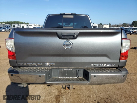 2016 Nissan Titan SL z VIN 1N6BA1F22GN503205, wystawiony jako Copart lot #47024925 z przebiegiem 90 936 mil mil oraz Czysty tytuł • Clean title. Historia ofert i sprzedaży dostępna na DreamBid. Obrazek 6.