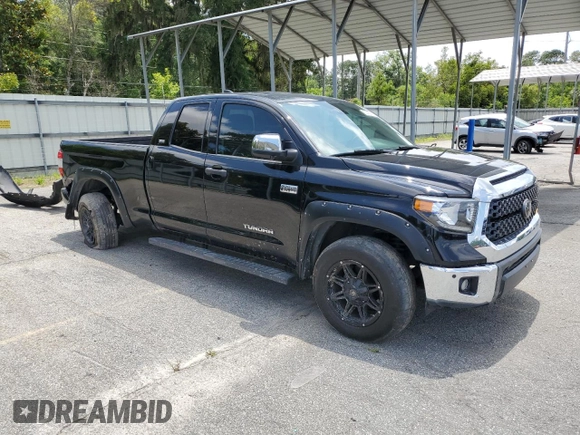 2021 Toyota Tundra SR with VIN 5TFRY5F10MX299595, listed as a Copart auction lot 58428885 with 43,707 mi miles and Salvage title. Bid and sale history available at DreamBid. Image 4.