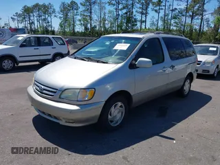 2001 Toyota Sienna LE with VIN 4T3ZF13CX1U372072, listed as a IAAI auction lot 41889291 with 228,959 mi miles. Bid and sale history available at carsss.com. Image 2.