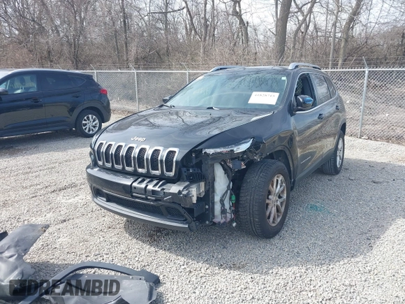 2015 Jeep Cherokee Latitude with VIN 1C4PJLCB3FW517843, listed as a IAAI auction lot 41828715 with 146,862 mi miles and . Bid and sale history available at DreamBid. Image 21.