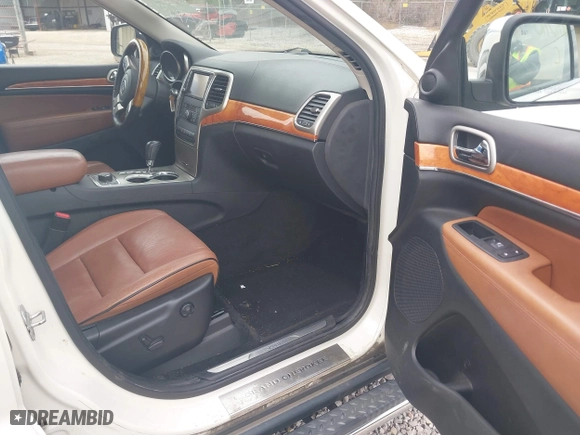 2012 Jeep Grand Cherokee Overland with VIN 1C4RJFCGXCC263065, listed as a IAAI auction lot 41942110 with 189,681 mi miles. Bid and sale history available at carsss.com. Image 5.