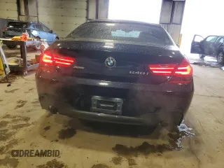 2015 BMW 6 Series 640i xDrive z VIN WBA6B8C58FD453159, wystawiony jako Copart lot #88931285 z przebiegiem 145 656 mil mil oraz Szkoda całkowita • Salvage title. Historia ofert i sprzedaży dostępna na DreamBid. Obrazek 6.