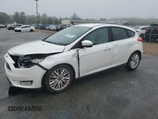2016 Ford Focus Titanium z VIN 1FADP3N2XGL321275, wystawiony jako Copart lot #61282845 z przebiegiem 111 519 mil mil oraz Szkoda całkowita • Salvage title. Historia ofert i sprzedaży dostępna na DreamBid. Obrazek 1.