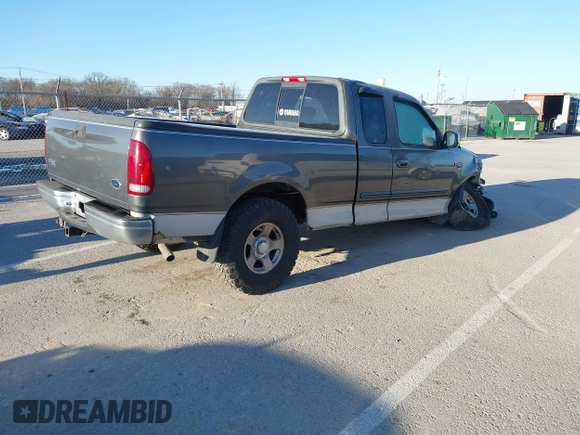 2002 Ford F-150 XL with VIN 1FTRX17L52NA85965, listed as a IAAI auction lot 41796633 with 171,814 mi miles. Bid and sale history available at carsss.com. Image 4.