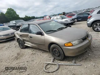1997 Mazda Protege DX z VIN JM1BC1414V0103244, wystawiony jako Copart lot #56219745 z przebiegiem Nie podano mil oraz Szkoda całkowita • Salvage title. Historia ofert i sprzedaży dostępna na DreamBid. Obrazek 4.