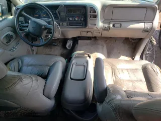 1999 Chevrolet Tahoe Z71 with VIN 1GNEK13R2XJ523810, listed as a Copart auction lot 64247874 with 151,373 mi miles and Salvage Title. Bid and sale history available at carsss.com. Image 8.