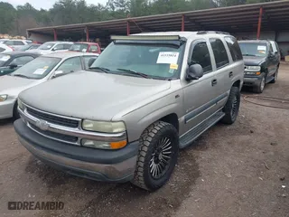 2003 Chevrolet Tahoe LS with VIN 1GNEC13V43R225216, listed as a IAAI auction lot 41535824 with 246,536 mi miles. Bid and sale history available at carsss.com. Image 2.