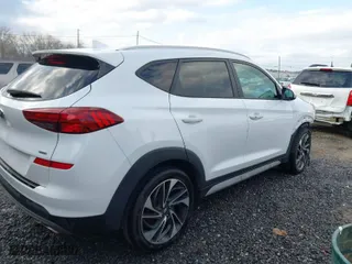 2020 Hyundai Tucson SEL with VIN KM8J3CAL5LU231183, listed as a IAAI auction lot 41509330 with 127,440 mi miles. Bid and sale history available at carsss.com. Image 4.