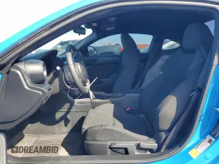 2023 Toyota GR86 with VIN JF1ZNBC11P8758861, listed as a Copart auction lot 77705634 with 11,684 mi miles and Salvage Title. Bid and sale history available at carsss.com. Image 7.