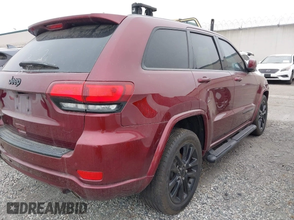 2018 Jeep Grand Cherokee Altitude with VIN 1C4RJEAG0JC433654, listed as a IAAI auction lot 42057867 with 103,552 mi miles and . Bid and sale history available at DreamBid. Image 4.