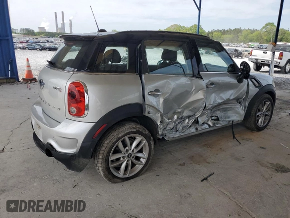 2014 MINI Countryman S with VIN WMWZC3C56EWP29211, listed as a Copart auction lot 52521145 with 91,396 mi miles and Salvage title. Bid and sale history available at DreamBid. Image 3.
