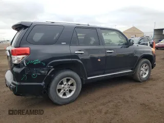 2010 Toyota 4Runner Trail with VIN JTEBU5JR0A5002371, listed as a Copart auction lot 60871795 with 169,676 mi miles and Salvage title. Bid and sale history available at DreamBid. Image 3.
