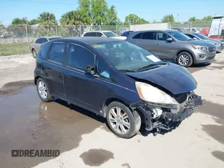2009 Honda Fit Sport z VIN JHMGE88409S030427, wystawiony jako IAAI lot #41723036 z przebiegiem 146 586 mil mil oraz . Historia ofert i sprzedaży dostępna na DreamBid. Obrazek 1.