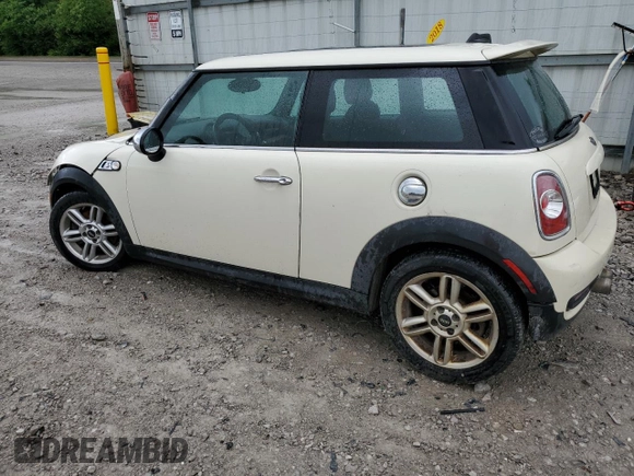 2011 MINI Hardtop S with VIN WMWSV3C56BTY15420, listed as a Copart auction lot 58050875 with 162,145 mi miles and Salvage title. Bid and sale history available at DreamBid. Image 2.