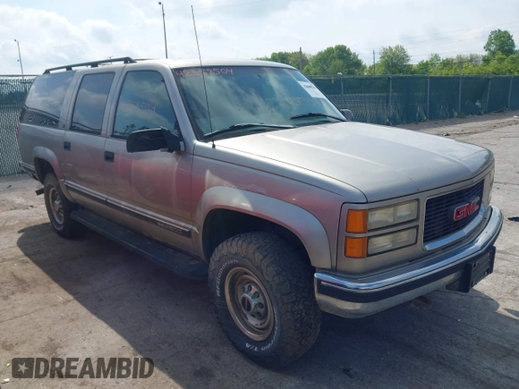 1999 GMC Suburban z VIN 3GKGK26J2XG505570, wystawiony jako IAAI lot #42358504 z przebiegiem 115 253 mil mil oraz . Historia ofert i sprzedaży dostępna na DreamBid. Obrazek 1.
