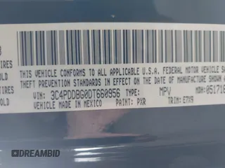 2013 Dodge Journey SXT with VIN 3C4PDDBG0DT660956, listed as a IAAI auction lot 41593385 with 196,021 mi miles and . Bid and sale history available at DreamBid. Image 9.