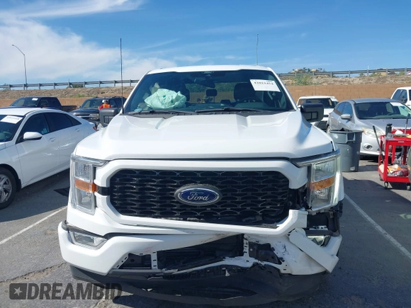 2021 Ford F-150 XL with VIN 1FTEW1CP2MKE42968, listed as a IAAI auction lot 42022454 with 32,908 mi miles. Bid and sale history available at carsss.com. Image 12.