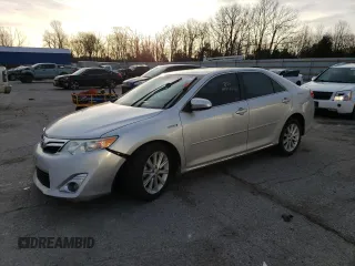 2012 Toyota Camry XLE z VIN 4T1BD1FK5CU046816, wystawiony jako Copart lot #52141865 z przebiegiem 242 479 mil mil oraz Szkoda całkowita • Salvage title. Historia ofert i sprzedaży dostępna na DreamBid. Obrazek 1.