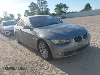 2007 BMW 3 Series 328i with VIN WBAWV13547P117295, listed as a IAAI auction lot 42020390 with 143,657 mi miles and . Bid and sale history available at DreamBid. Image 1.