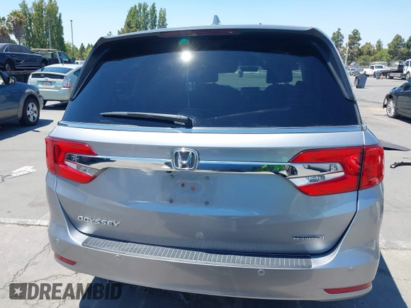 2018 Honda Odyssey Touring with VIN 5FNRL6H81JB022975, listed as a IAAI auction lot 42653304 with 210,137 mi miles and . Bid and sale history available at DreamBid. Image 17.
