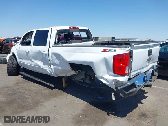2015 Chevrolet Silverado 1500 LT with VIN 1GCUKREC5FF199331, listed as a IAAI auction lot 42111381 with 180,056 mi miles and . Bid and sale history available at DreamBid. Image 3.