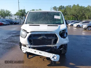 2021 Ford Transit Cargo with VIN 1FTBR1Y82MKA53386, listed as a IAAI auction lot 42058972 with 98,677 mi miles. Bid and sale history available at carsss.com. Image 13.