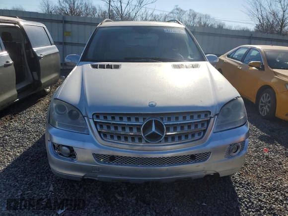 2006 Mercedes-Benz M 350 with VIN 4JGBB86E46A005608, listed as a Copart auction lot 87710135 with 139,771 mi miles and Clean Title. Bid and sale history available at DreamBid. Image 9.