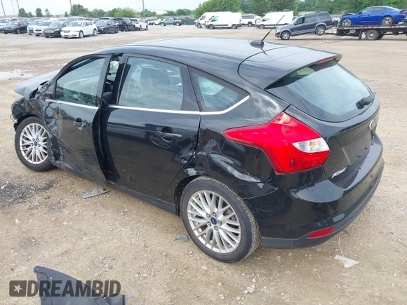 2014 Ford Focus Titanium with VIN 1FADP3N25EL194433, listed as a IAAI auction lot 42512912 with 105,355 mi miles and . Bid and sale history available at DreamBid. Image 3.