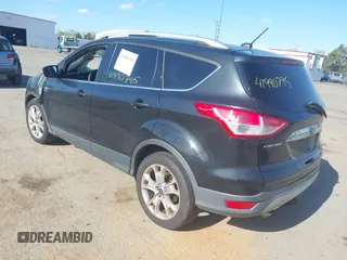 2015 Ford Escape Titanium with VIN 1FMCU9J94FUC33962, listed as a IAAI auction lot 41990795 with Not provided miles and . Bid and sale history available at DreamBid. Image 3.