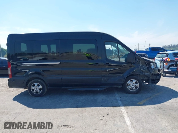 2019 Ford Transit Passenger XL z VIN 1FBAX2CG4KKA76658, wystawiony jako IAAI lot #41859748 z przebiegiem 155 033 mil mil oraz . Historia ofert i sprzedaży dostępna na DreamBid. Obrazek 13.