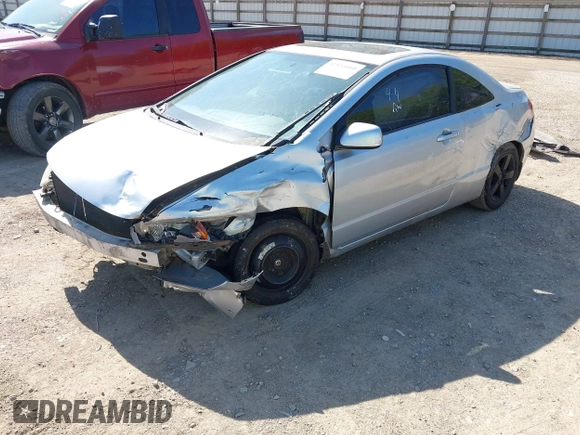 2007 Honda Civic Cpe EX with VIN 2HGFG128X7H547623, listed as a IAAI auction lot 42033010 with 228,518 mi miles. Bid and sale history available at carsss.com. Image 2.