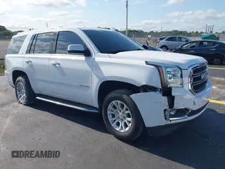 2020 GMC Yukon SLT z VIN 1GKS1BKCXLR247345, wystawiony jako IAAI lot #42220127 z przebiegiem 61 422 mil mil oraz . Historia ofert i sprzedaży dostępna na DreamBid. Obrazek 1.
