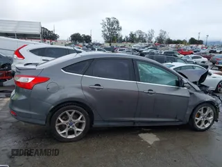 2013 Ford Focus Titanium with VIN 1FADP3J2XDL270393, listed as a IAAI auction lot 41814775 with 76,907 mi miles and . Bid and sale history available at carsss.com. Image 14.
