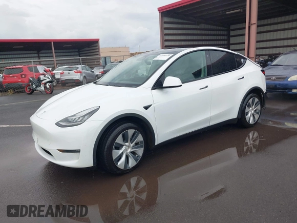 2020 Tesla Model Y Long Range z VIN 5YJYGDEE3LF043800, wystawiony jako IAAI lot #41590220 z przebiegiem 62 341 mil mil oraz . Historia ofert i sprzedaży dostępna na DreamBid. Obrazek 20.