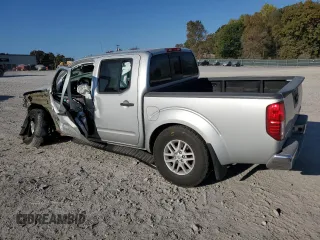2015 Nissan Frontier S with VIN 1N6AD0EV3FN705610, listed as a Copart auction lot 77530764 with 165,782 mi miles and Salvage title. Bid and sale history available at DreamBid. Image 2.