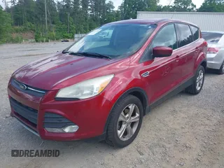 2013 Ford Escape SE with VIN 1FMCU0GX6DUA91192, listed as a IAAI auction lot 42157380 with 170,628 mi miles and . Bid and sale history available at DreamBid. Image 2.