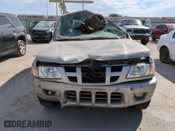2004 Isuzu Rodeo S with VIN 4S2DM58W144316571, listed as a Copart auction lot 72086554 with Not Provided miles and Salvage Title. Bid and sale history available at DreamBid. Image 5.