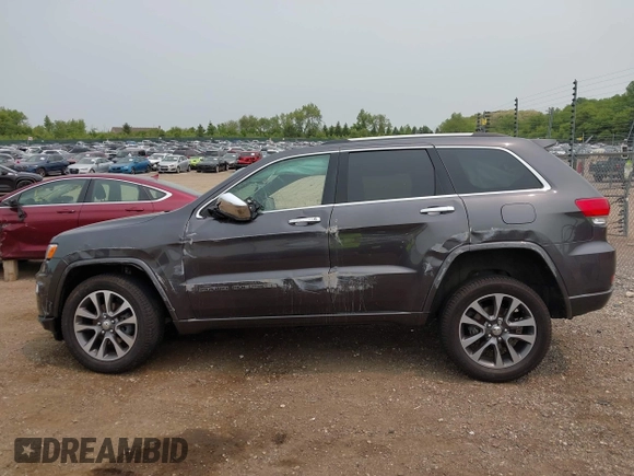2017 Jeep Grand Cherokee Overland with VIN 1C4RJFCG6HC964435, listed as a IAAI auction lot 42407567 with 113,760 mi miles and . Bid and sale history available at DreamBid. Image 15.