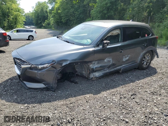2019 Mazda CX-9 Touring z VIN JM3TCBCY5K0328655, wystawiony jako Copart lot #64627255 z przebiegiem 54 658 mil mil oraz Szkoda całkowita • Salvage title. Historia ofert i sprzedaży dostępna na DreamBid. Obrazek 1.