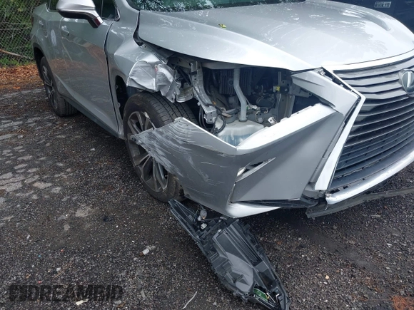 2018 Lexus RX 350 z VIN 2T2ZZMCA4JC100212, wystawiony jako IAAI lot #42197456 z przebiegiem 63 078 mil mil oraz . Historia ofert i sprzedaży dostępna na DreamBid. Obrazek 6.