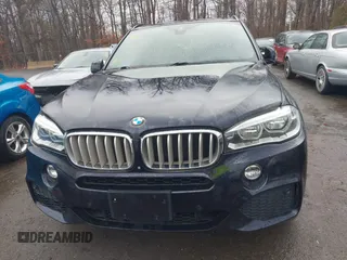 2014 BMW X5 xDrive50i with VIN 5UXKR6C59E0C03597, listed as a IAAI auction lot 41866944 with 65,890 mi miles. Bid and sale history available at carsss.com. Image 12.