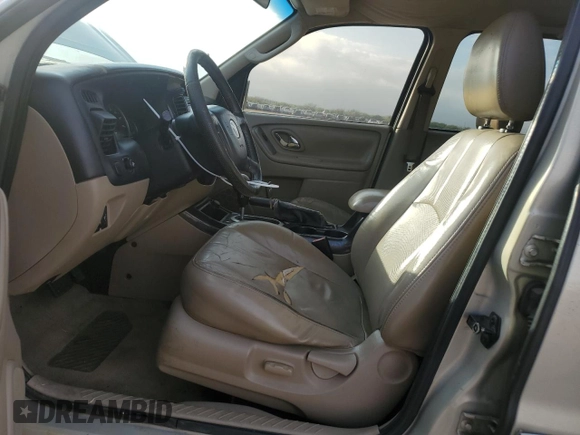 2005 Mazda Tribute i with VIN 4F2YZ02Z95KM44817, listed as a Copart auction lot 85033344 with 258,976 mi miles and Salvage Title. Bid and sale history available at carsss.com. Image 7.