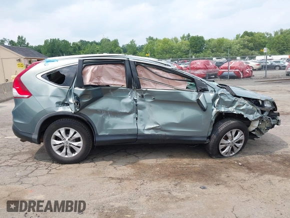 2012 Honda CR-V EX-L with VIN 2HKRM4H78CH601054, listed as a IAAI auction lot 42444157 with 113,491 mi miles and . Bid and sale history available at DreamBid. Image 14.