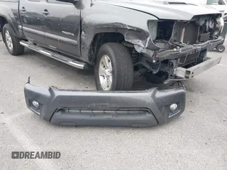 2014 Toyota Tacoma PreRunner with VIN 3TMKU4HN9EM041509, listed as a IAAI auction lot 42441194 with 290,715 mi miles and . Bid and sale history available at DreamBid. Image 20.
