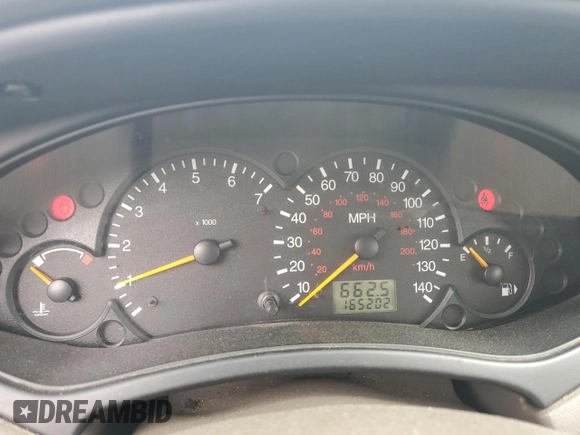 2000 Ford Focus SE with VIN 1FAFP3433YW354797, listed as a Copart auction lot 61430265 with 165,202 mi miles and Salvage title. Bid and sale history available at DreamBid. Image 9.