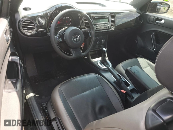2015 Volkswagen Beetle Fleet Edition with VIN 3VWF17ATXFM645590, listed as a Copart auction lot 58234745 with 128,469 mi miles and Salvage title. Bid and sale history available at DreamBid. Image 8.